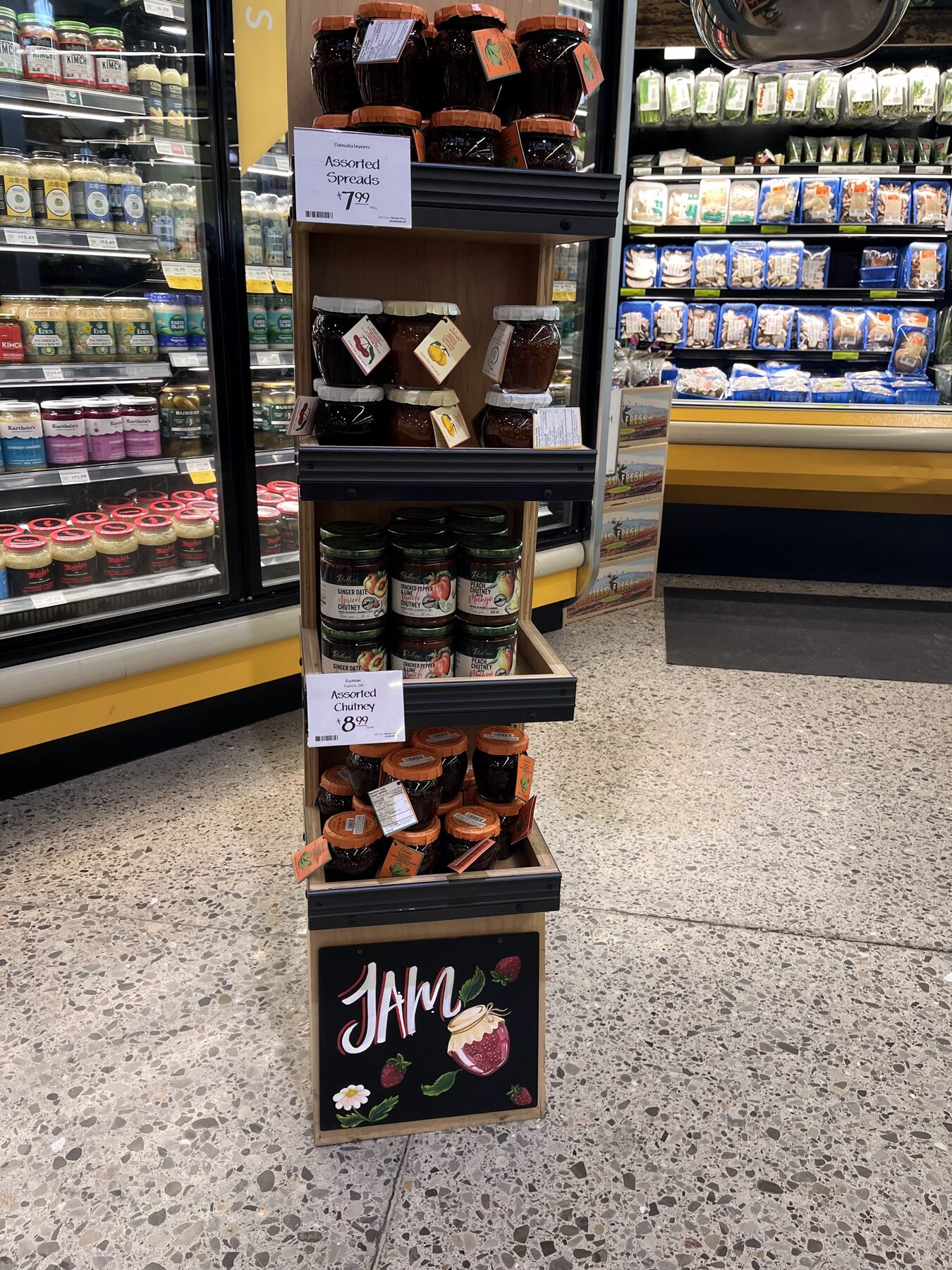 Jam promotional chalkboard shown in a retail display
