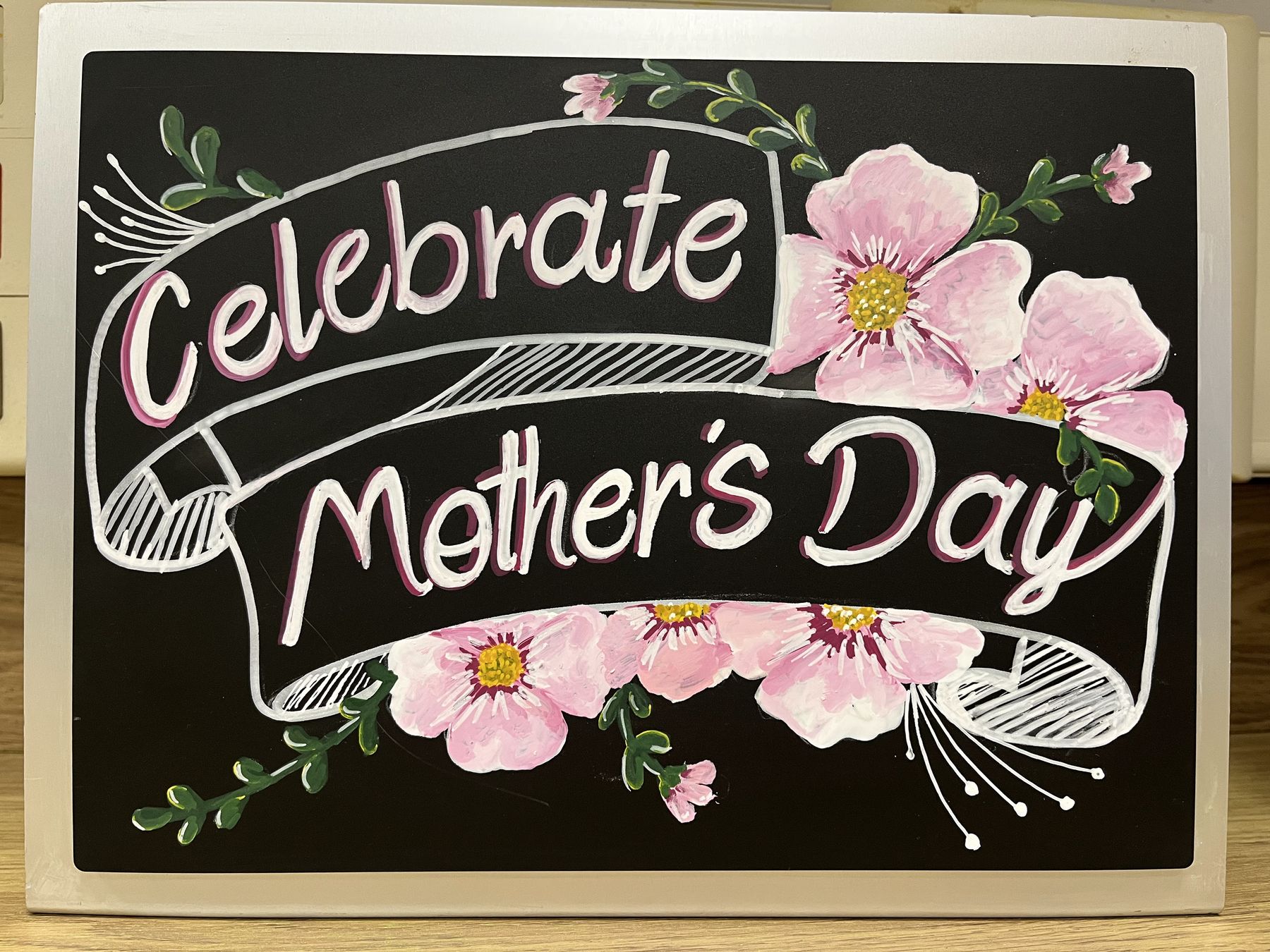 Mother's Day promotional chalkboard lettering and floral artwork